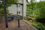 Picnic table and grill at your building for you to enjoy